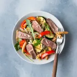 Pasta salad with grilled vegetables and steak