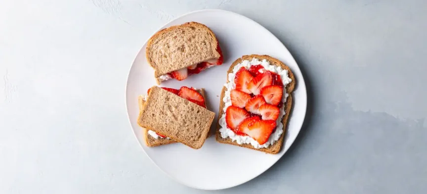 Sandwich with strawberry, cottage cheese and jam