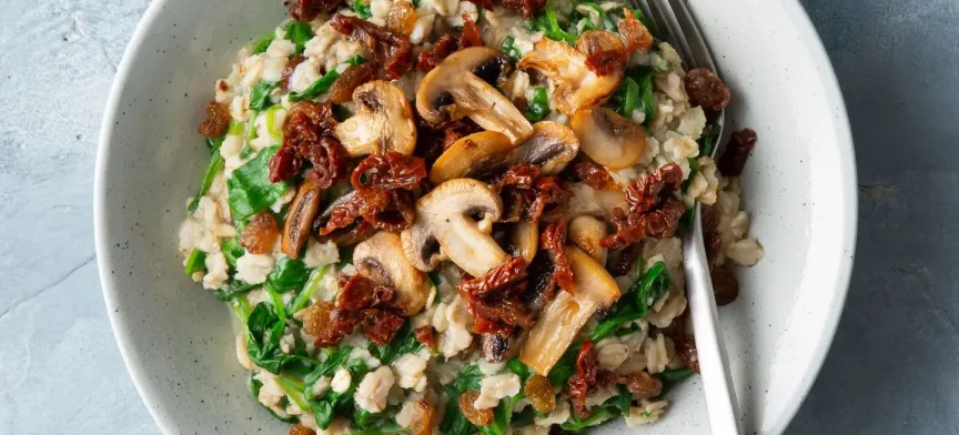 Savory oatmeal with mushrooms and sun-dried tomatoes